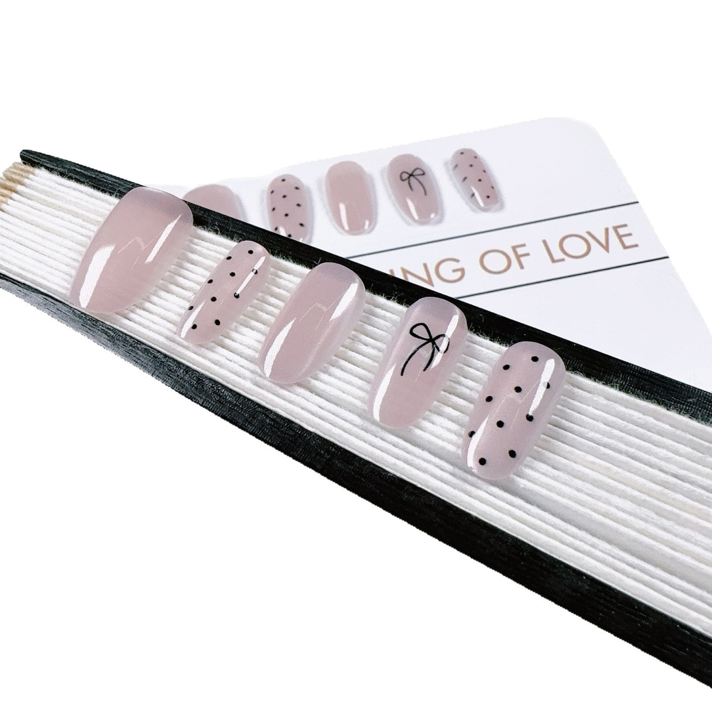 Pre-designed press-on nail tips featuring handmade airbrushed gel polish in elegant French gradients, soft blush tones, and classic solid colors. Ideal as semi-finished nail art bases for quick salon-style looks.