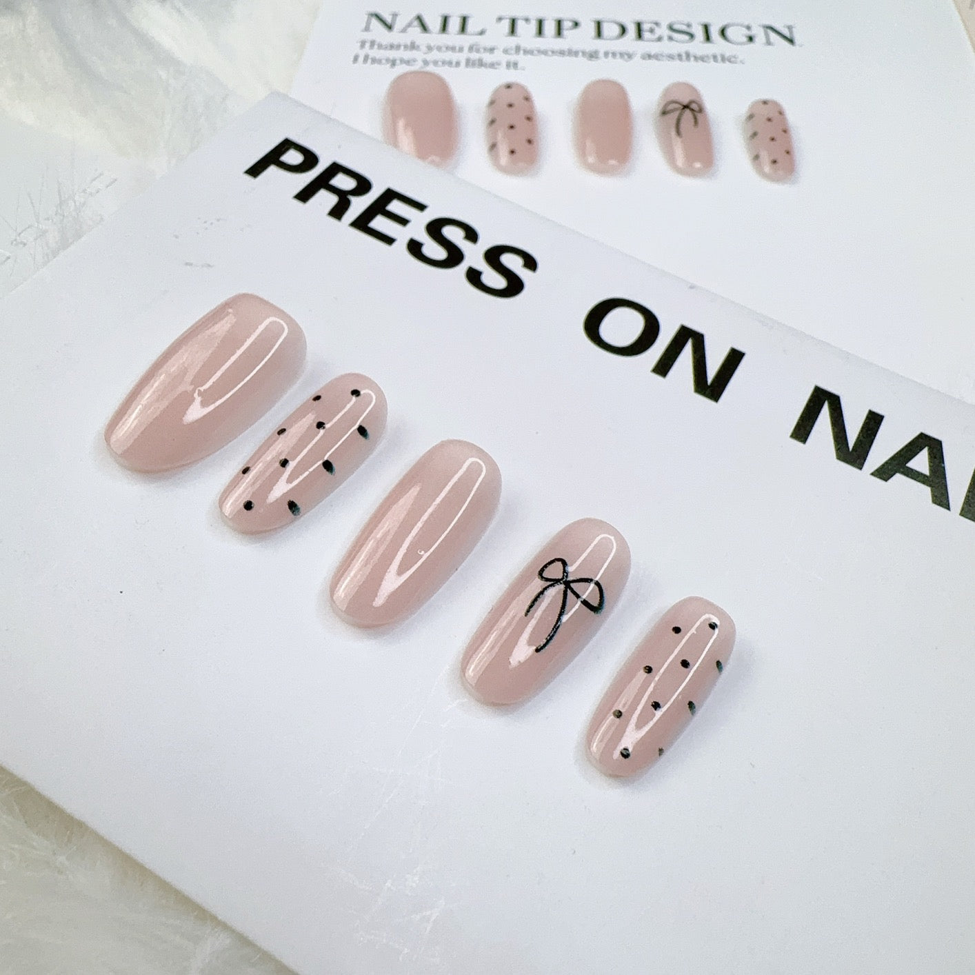 Pre-designed press-on nail tips featuring handmade airbrushed gel polish in elegant French gradients, soft blush tones, and classic solid colors. Ideal as semi-finished nail art bases for quick salon-style looks.
