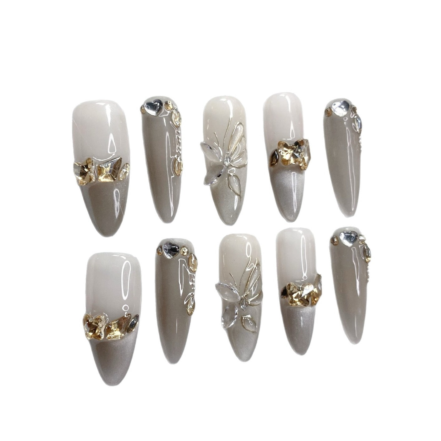 Purely handmade butterfly-shaped nail tips with dense cat's eye patterns, high-end nail art, gradient color change, and light luxury studded with rhinestones.
