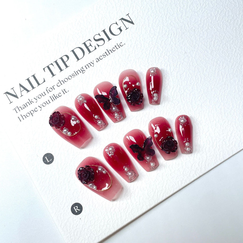 Dark red butterfly-shaped nail decorations for 2025 new style. Complementary accessories made of pure handcrafted materials. Environmentally friendly. Easy to wear. Suitable for parties and daily outings.
