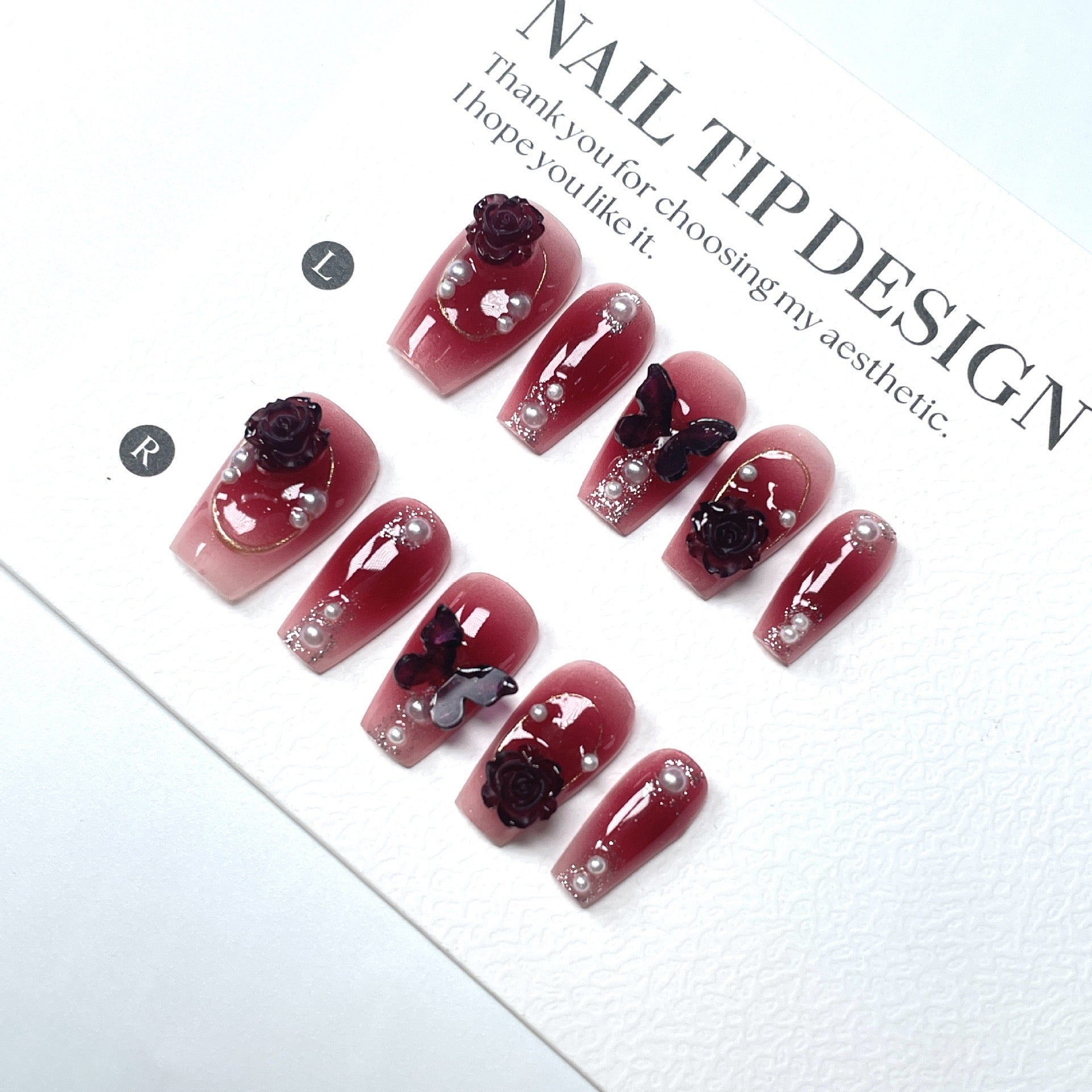 Dark red butterfly-shaped nail decorations for 2025 new style. Complementary accessories made of pure handcrafted materials. Environmentally friendly. Easy to wear. Suitable for parties and daily outings.
